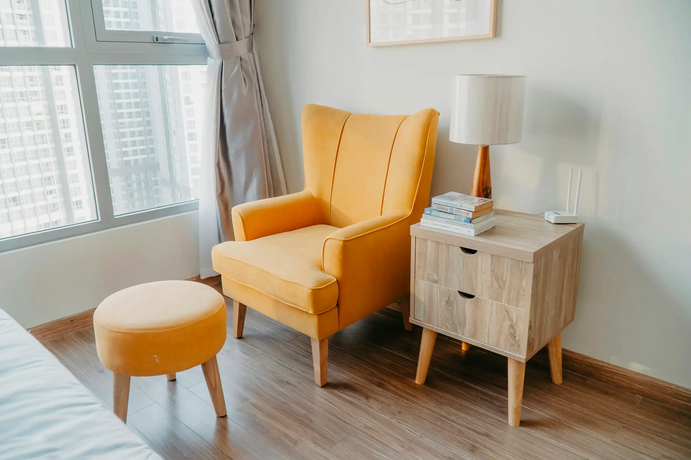 A finished bedroom with an assembled wardrobe, bed frame and nightstand